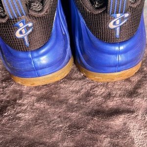 Blue and Black Nike shoes